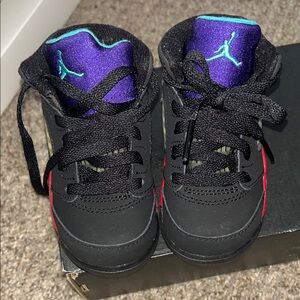 Jordan Kids Black and Red Sneakers with Purple Accents